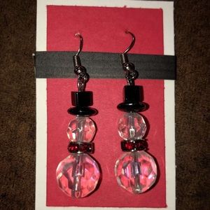 Eye - catching snowman earrings